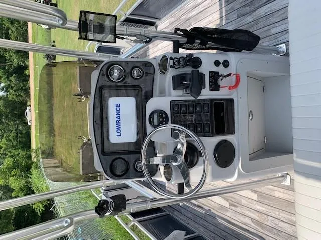 Slide: The Image of 2019 Angler Qwest 824 Crappie Edition boat dashboard with Lowrance electronics. - 5