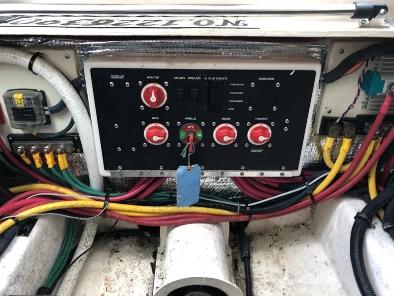Slide: The Image of Electrical panel of a 2008 Back Cove 29 boat with colorful wiring. - 23