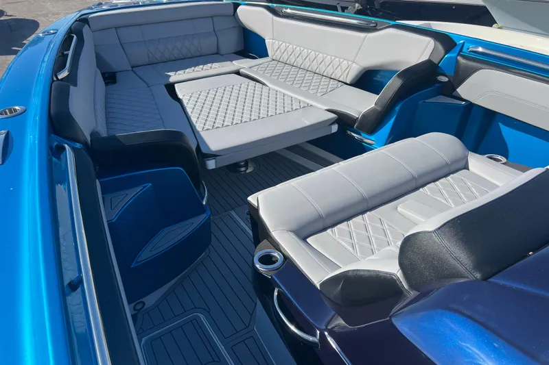 Slide: The Image of 2026 Nor-Tech 450 Sport boat interior with luxurious seating and modern design. - 18