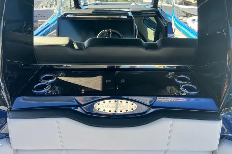Slide: The Image of 2026 Nor-Tech 450 Sport boat interior with sleek seating and cup holders. - 33