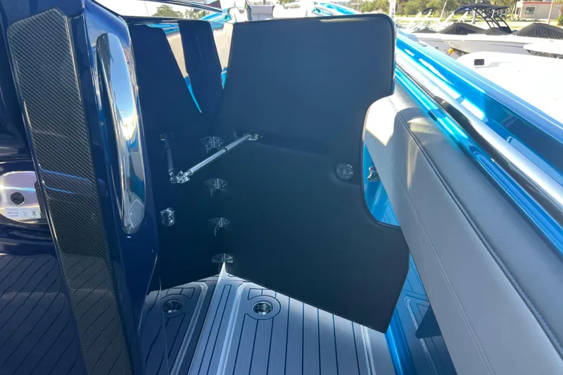 Slide: The Image of 2026 Nor-Tech 450 Sport boat interior with open door and sleek design. - 47