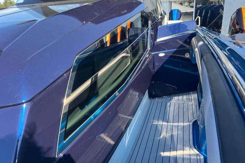 Slide: The Image of 2026 Nor-Tech 450 Sport boat, sleek blue exterior with modern design details. - 48