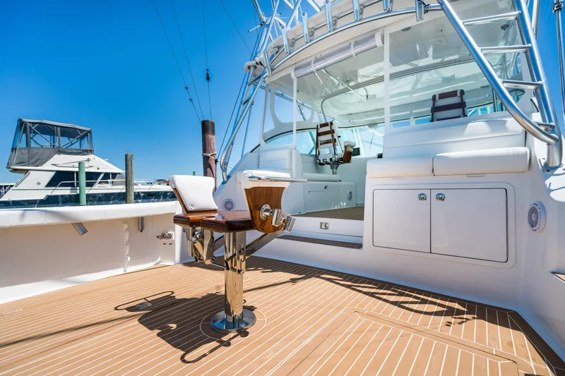 Slide: The Image of 2025 Henriques 35 Express yacht with spacious deck and modern seating. - 11