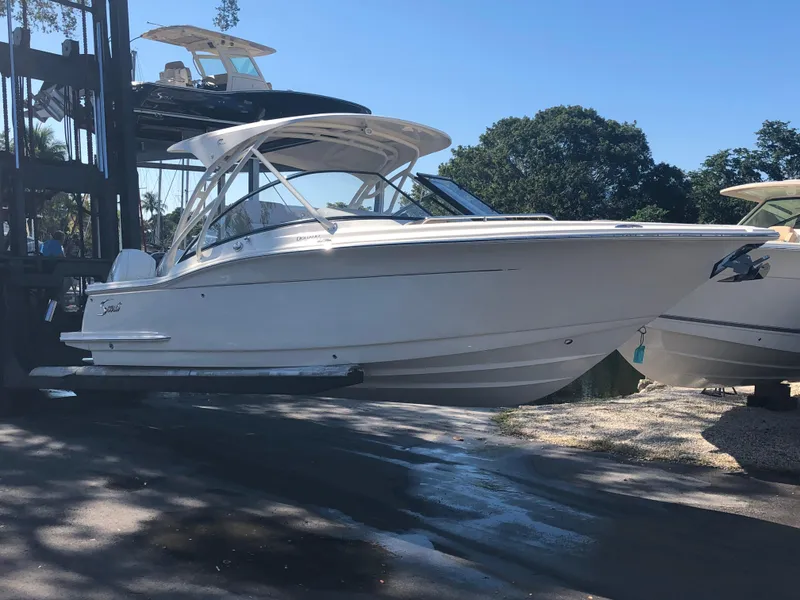 The Image of Scout 255 Dorado 2026 on an outdoor boat lift. - 0