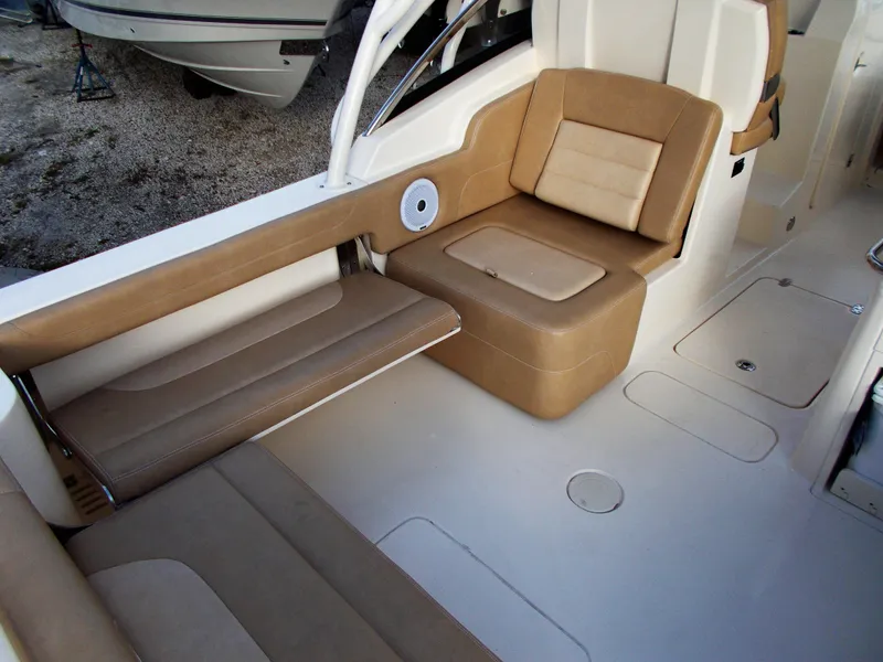 Slide: The Image of Interior of 2026 Scout 255 Dorado with beige seating. - 16