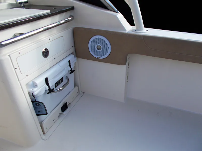 Slide: The Image of Interior of 2026 Scout 255 Dorado with Yeti cooler. - 24