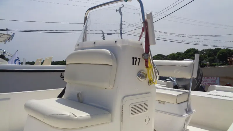 Slide: The Image of 2015 Key West 177 Skiff boat interior with seating and console. - 7