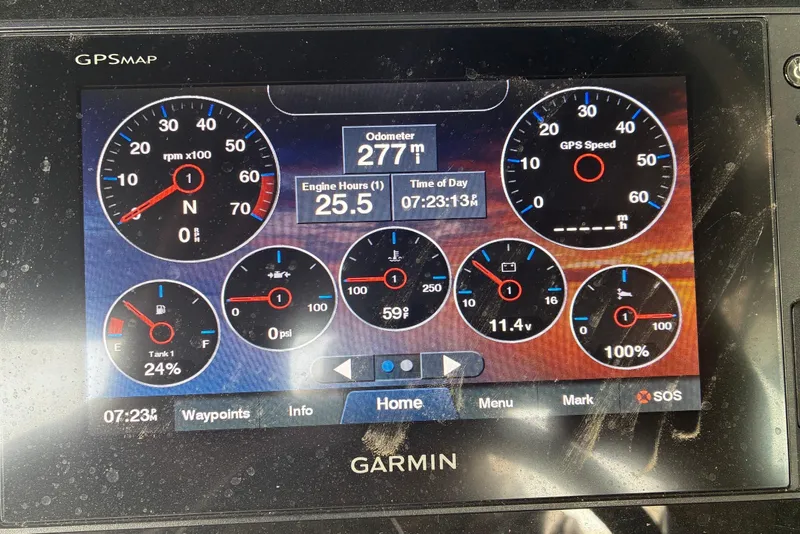 Slide: The Image of Garmin GPS display showing Regal LS4 engine metrics and navigation data. - 11