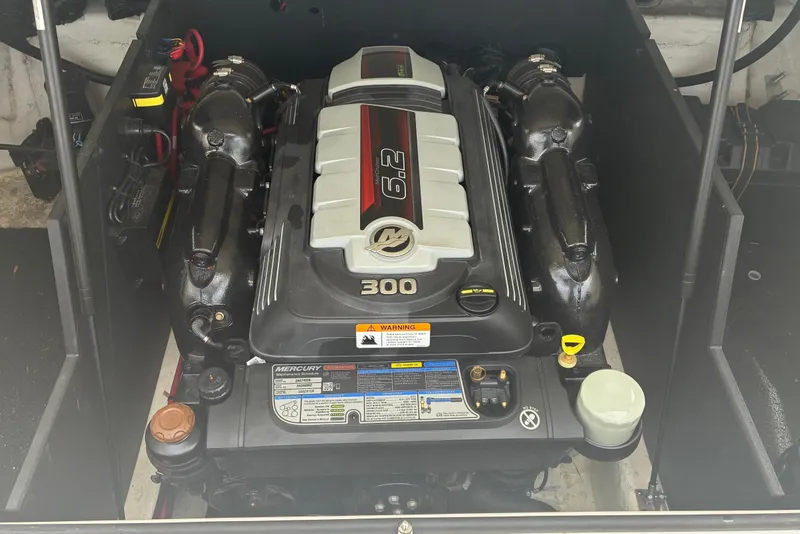 Slide: The Image of 2020 Regal LS4 engine compartment featuring a Mercury 6.2L V8 engine. - 12