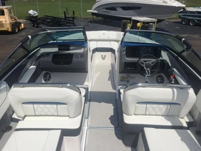 Slide: The Image of Interior of a 2020 Regal LS4 boat with white upholstery. - 17