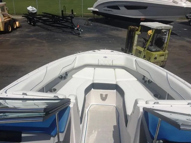 Slide: The Image of 2020 Regal LS4 boat, interior view, parked on a lot. - 22