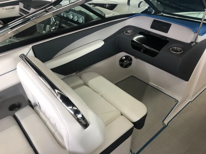 Slide: The Image of Interior of a 2020 Regal LS4 boat with luxurious seating. - 31