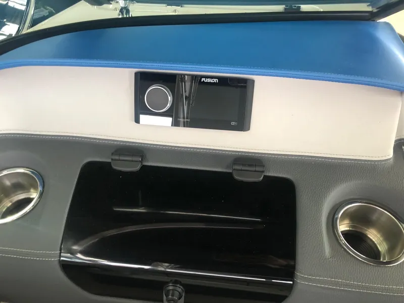 Slide: The Image of Dashboard of a 2020 Regal LS4 boat with Fusion stereo system. - 36