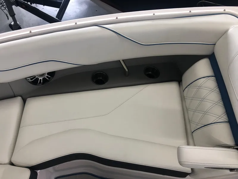 Slide: The Image of Interior of a 2020 Regal LS4 boat with white upholstery. - 39