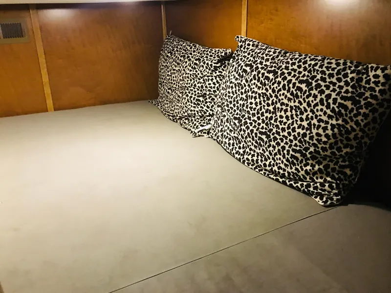 Slide: The Image of Cozy bed with leopard print pillows in 2014 Bravada Imagination Trip 11. - 14