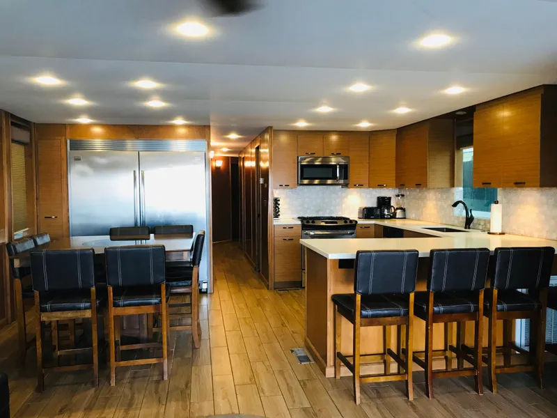 Slide: The Image of Modern kitchen interior in Bravada Imagination Trip 11, 2014, with wood flooring and sleek appliances. - 15