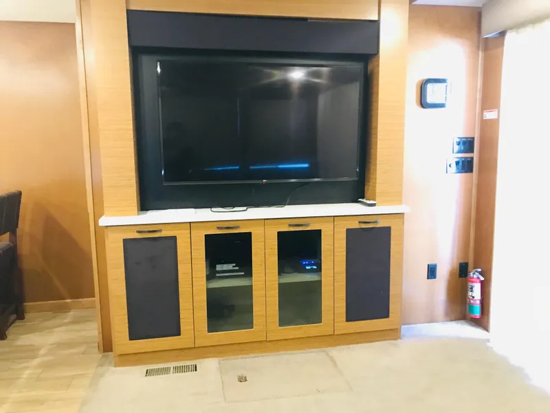 Slide: The Image of Entertainment center with large TV in 2014 Bravada Imagination Trip 11 Shared Ownership. - 21