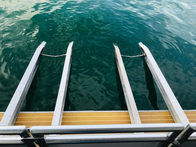 Slide: The Image of Boat ladder on Bravada Imagination Trip 11, 2014, leading into clear water. - 24