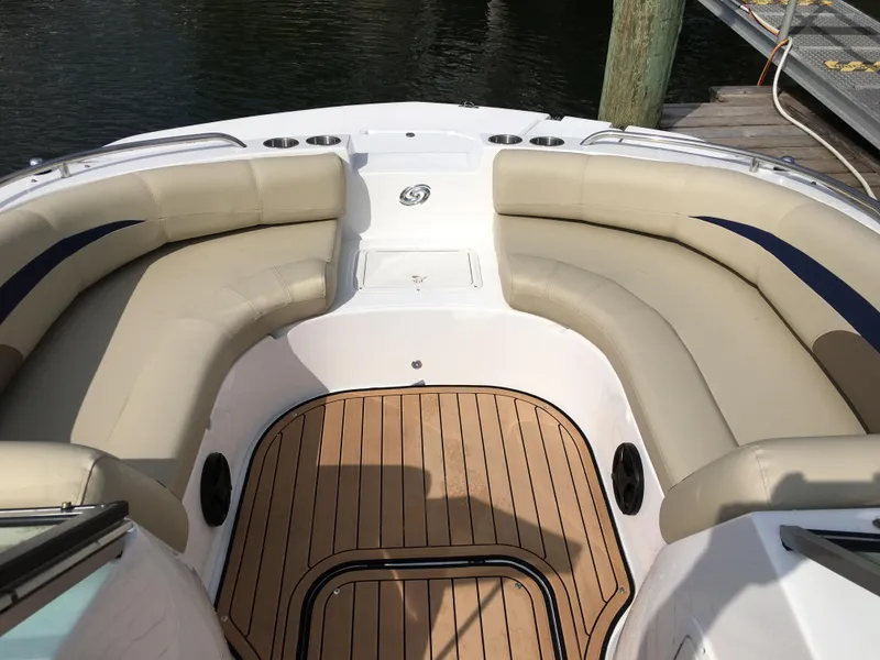 Slide: The Image of 2019 Hurricane SD 187 boat interior with beige seating and wood-style flooring. - 3