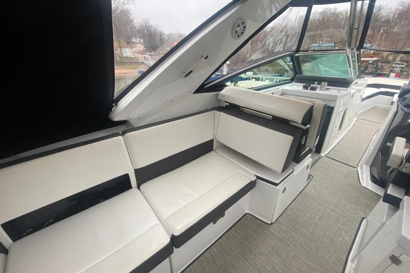 Slide: The Image of 2020 Monterey 385 Super Express interior with white seating and modern design. - 32