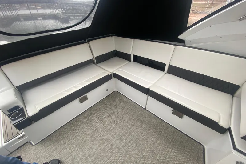 Slide: The Image of Luxurious seating area on a 2020 Monterey 385 Super Express boat. - 31