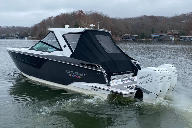 Slide: The Image of 2020 Monterey 385 Super Express boat with Mercury engines on a lake. - 38