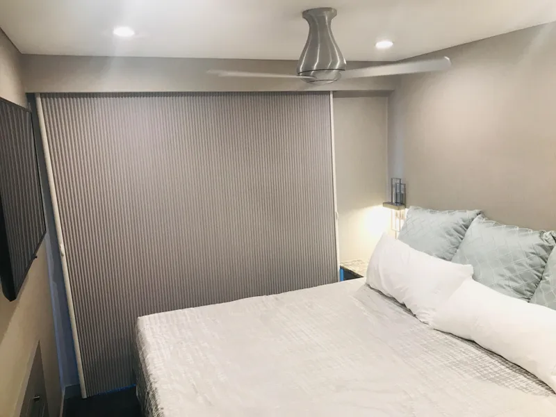 Slide: The Image of Modern bedroom interior in Adonia Inspiration Trip #9, 2019, with ceiling fan and cozy bedding. - 14