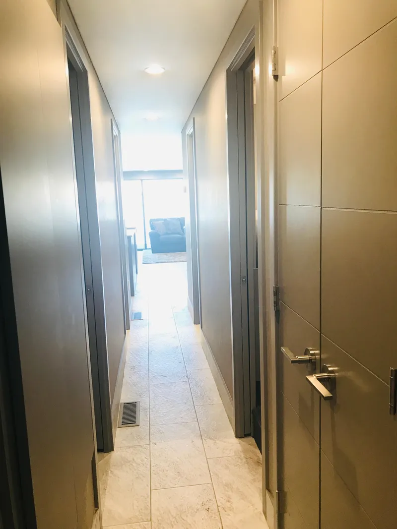 Slide: The Image of Narrow hallway with tiled floor, leading to a bright living area, Adonia Inspiration Trip #9, 2019. - 20