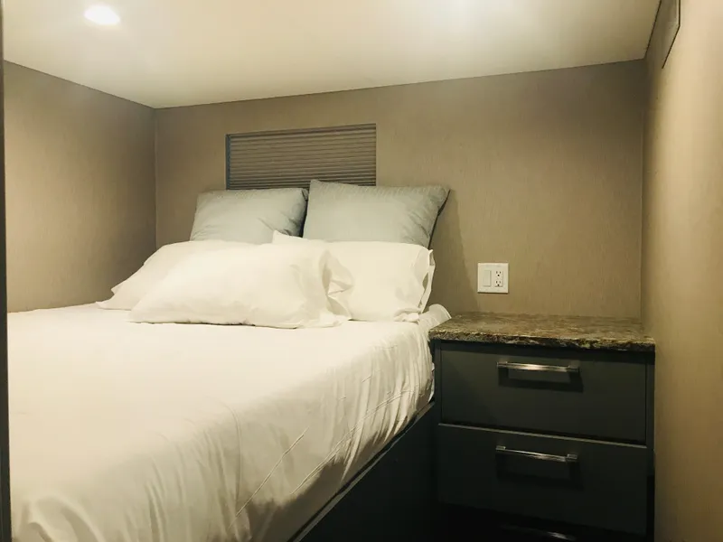 Slide: The Image of Cozy bedroom interior in 2019 Adonia Inspiration Trip #9 RV with bed and nightstand. - 22