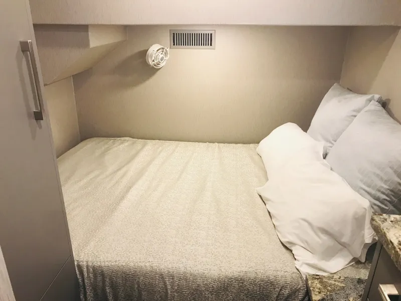 Slide: The Image of Compact bedroom in Adonia Inspiration Trip #9, 2019 model, featuring a cozy bed and reading light. - 24