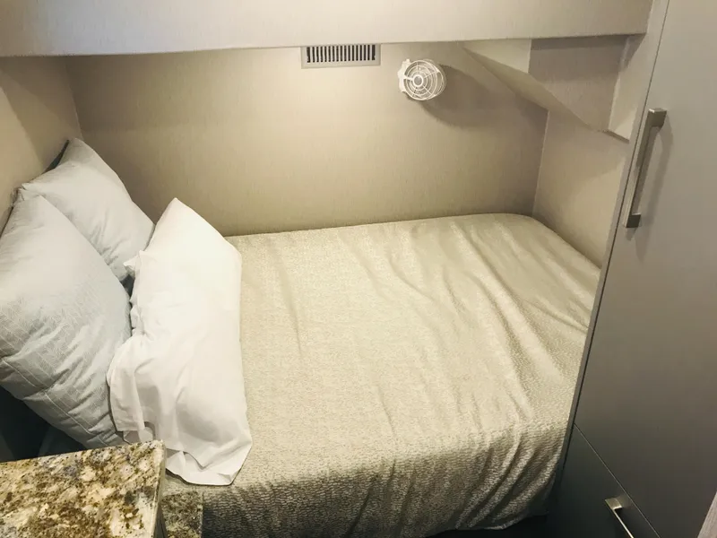 Slide: The Image of Compact bedroom interior in Adonia Inspiration Trip #9, 2019 model, featuring a cozy bed. - 27