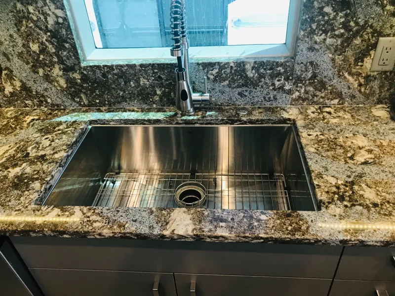 Slide: The Image of Granite countertop with stainless steel sink and modern faucet, Adonia Inspiration Trip #9, 2019. - 7
