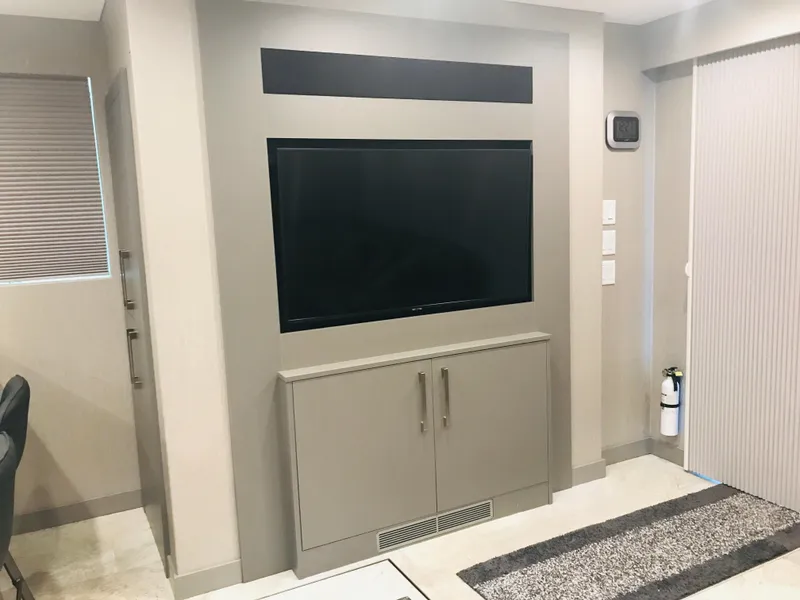 Slide: The Image of Modern living room with wall-mounted TV and sleek cabinet, Adonia Inspiration Trip #9, 2019. - 9