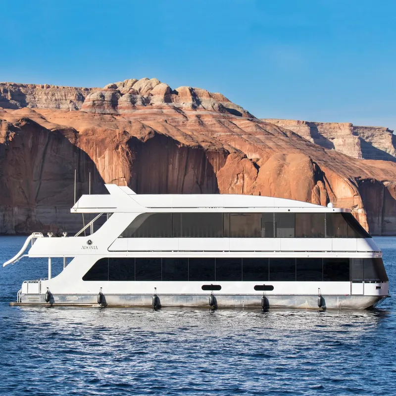 Slide: The Image of Luxury yacht Adonia against stunning rock formations, 2018. - 0
