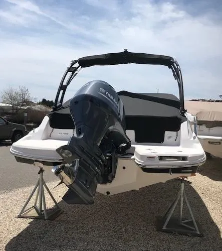 Slide: The Image of 2023 Regal 21 OBX boat with Yamaha outboard motor on display. - 2