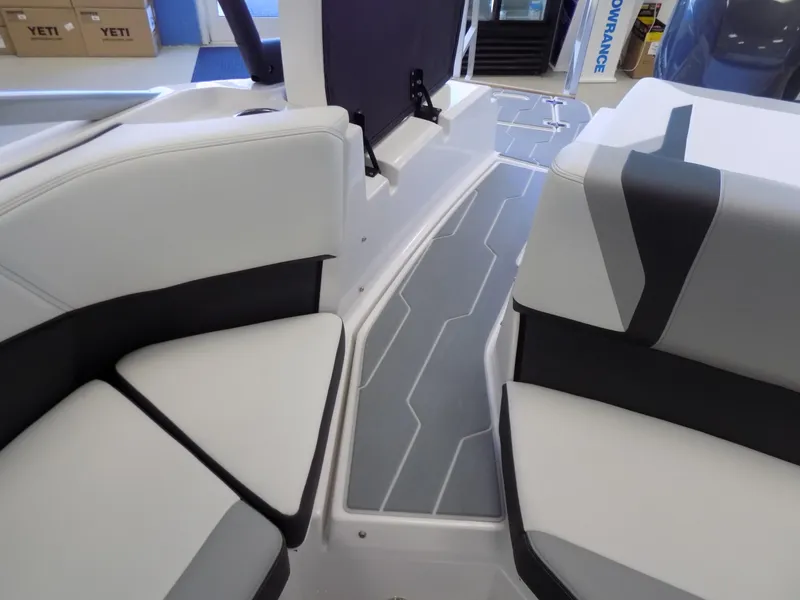 Slide: The Image of 2023 Regal 21 OBX boat interior with modern seating and sleek design. - 21