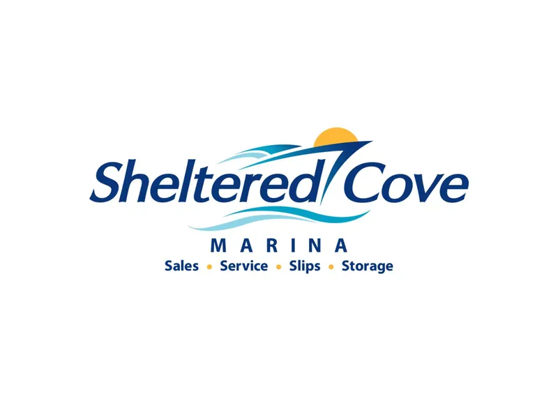Slide: The Image of Sheltered Cove Marina logo with sales, service, slips, storage text. - 24