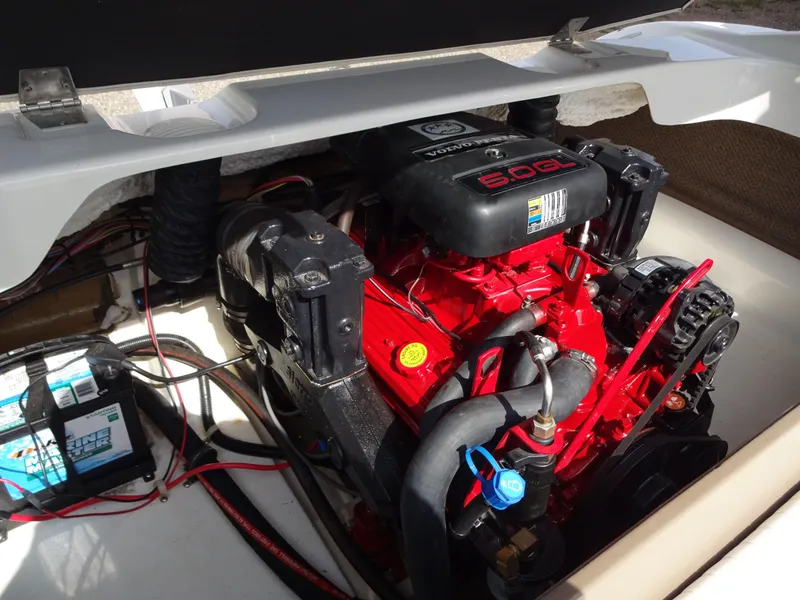 Slide: The Image of 2005 Glastron SX195 boat engine compartment with Volvo Penta 5.0GL engine. - 9