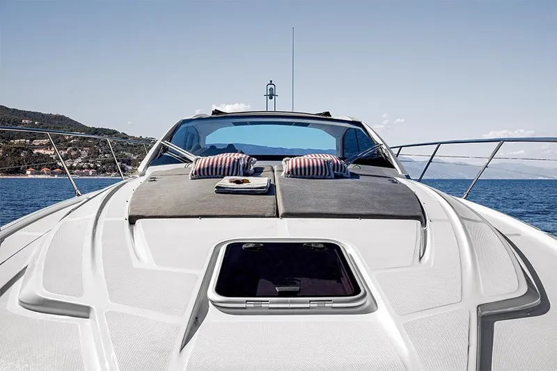 Slide: The Image of 2023 Azimut A45 yacht with sunbathing area and scenic ocean view. - 10