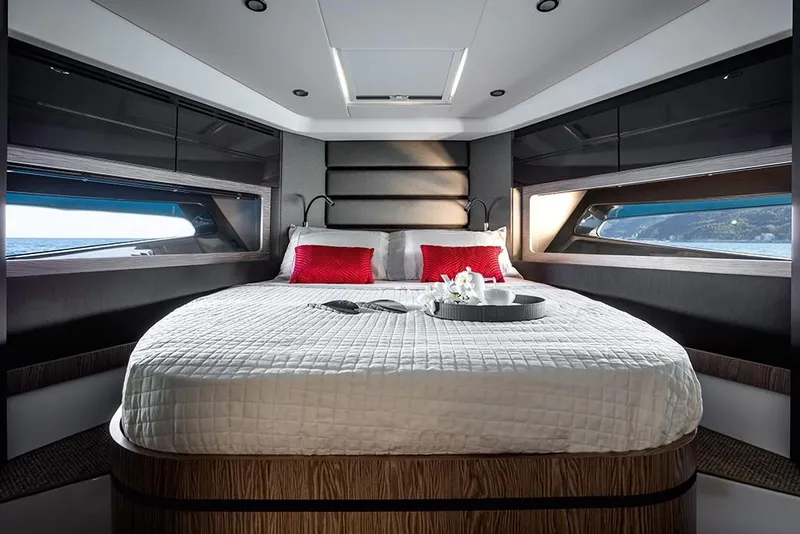 Slide: The Image of Luxurious bedroom interior of 2023 Azimut A45 yacht with modern design and large windows. - 24