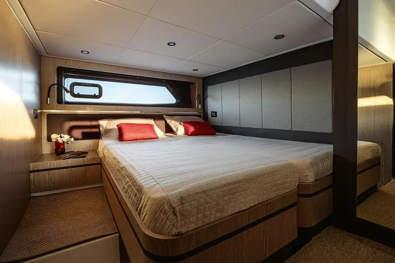 Slide: The Image of Luxurious bedroom interior of 2023 Azimut A45 yacht with modern design and large bed. - 26