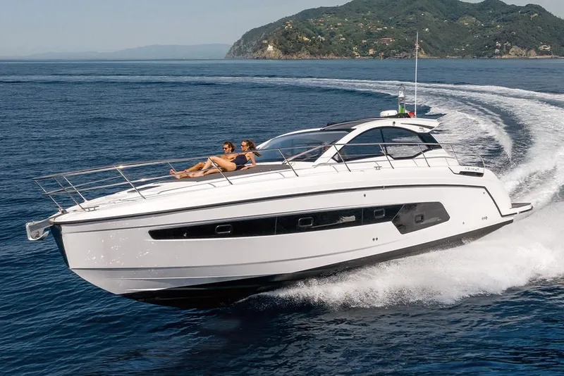 Slide: The Image of 2023 Azimut A45 yacht cruising with passengers on a sunny day. - 3