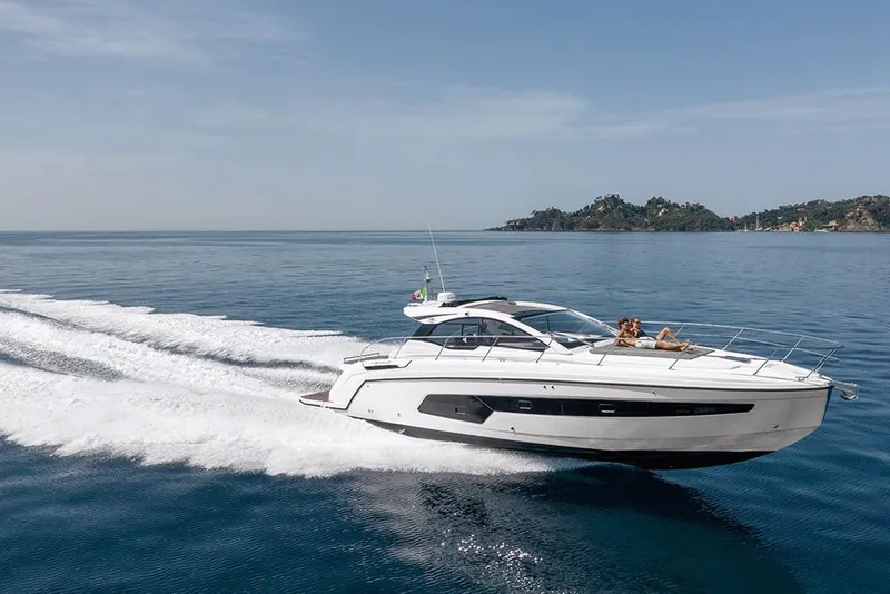 Slide: The Image of 2023 Azimut A45 yacht cruising on open water. - 4