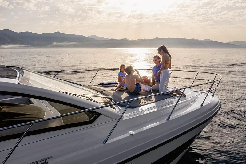 Slide: The Image of Family enjoying sunset on 2023 Azimut A45 yacht. - 5
