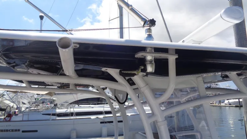 Slide: The Image of 2017 Sportsman 312 Open boat structure with marina background. - 13