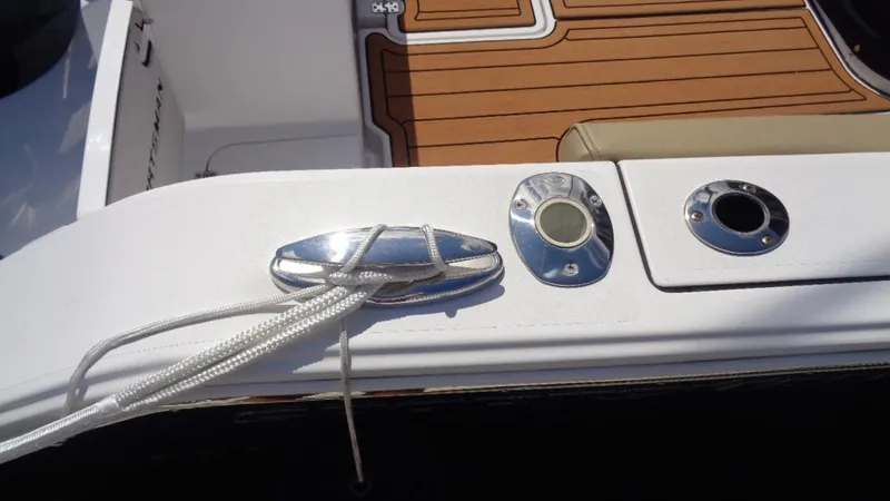 Slide: The Image of 2017 Sportsman 312 Open boat deck with cleat and rope detail. - 15