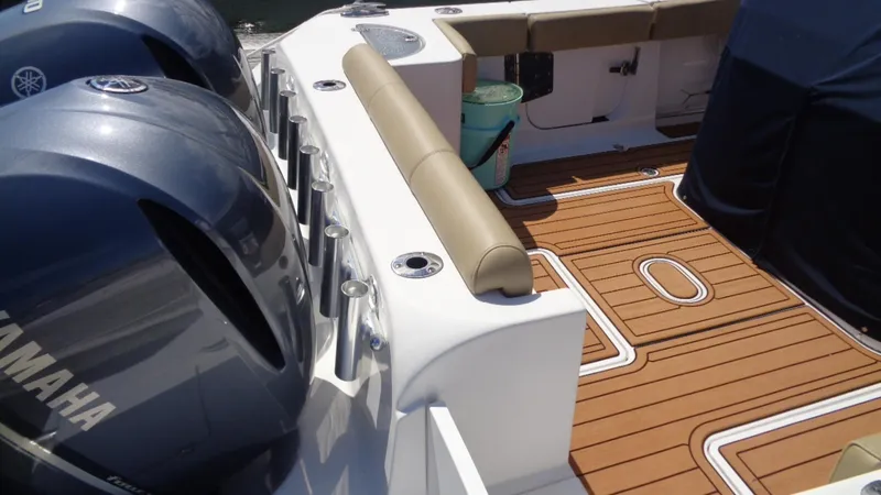 Slide: The Image of 2017 Sportsman 312 Open boat deck with Yamaha engines and teak flooring. - 16