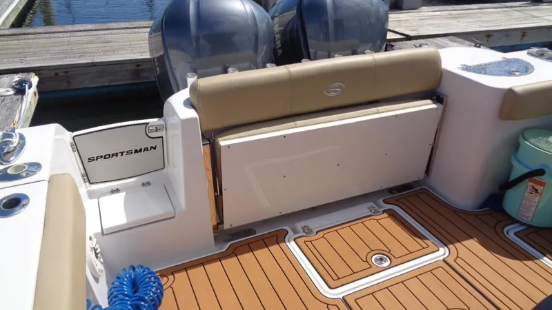 Slide: The Image of 2017 Sportsman 312 Open boat interior with seating and deck details. - 9