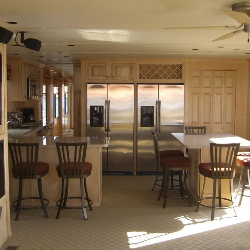 Slide: The Image of Luxurious kitchen interior of 2007 Stardust Cruisers Sundancer Trip 7 houseboat with modern appliances. - 1