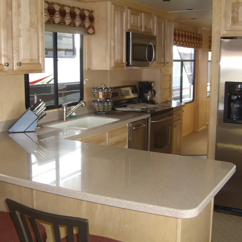 Slide: The Image of Luxurious kitchen interior of 2007 Stardust Cruisers Sundancer Trip 7 houseboat. - 2